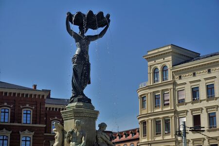 Clam maid fountain on the Post Square in the city of Goerlitz, Germanyの写真素材
