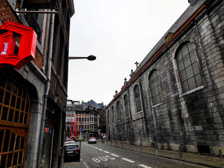 Typical scene in the Rue Hors-Chateau in the city of Liege, Belgium with Espace Saint-Antoineの写真素材