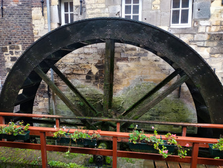 Still standing Water wheel of bishops mill in the city center of Maastricht, Netherlandsの写真素材