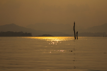 Sunset âKhao Laemâ  Dam in Thailand.の写真素材