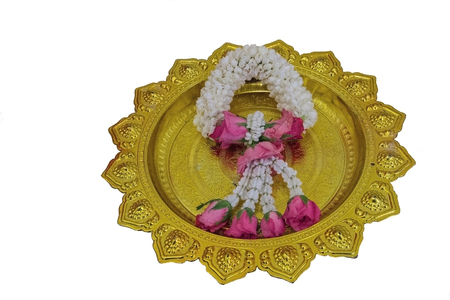 garland and tray with pedestal in white backgroundの写真素材