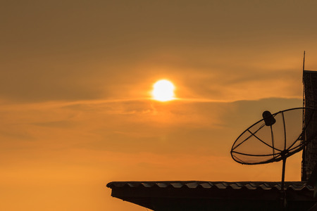 Satellite dish, sky at twilight timeの写真素材