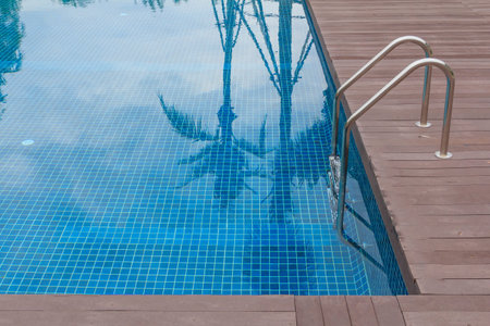 Blue swimming pool is empty.