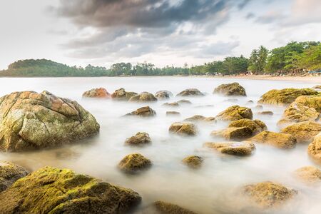 rock beach with long exposure photographyの写真素材
