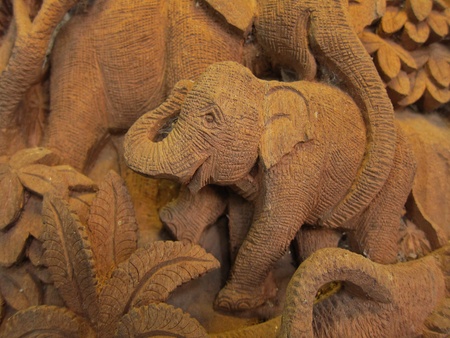 Elephant in Forest High relief Carving and sculpture in thailand の写真素材