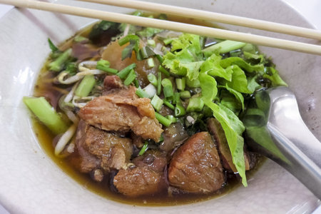 bowl of thai style pork noodle soup thailand