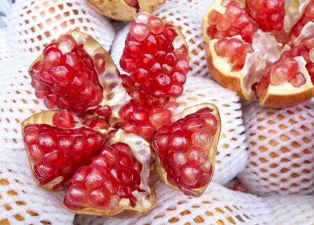 red pomegranate on packageの写真素材