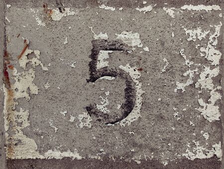 Number 5 on texture old cementの写真素材