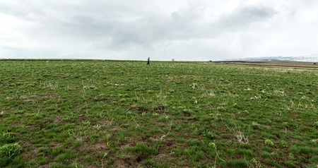 Storm over spring agricultural fields. Aksu dzhabaglyの写真素材
