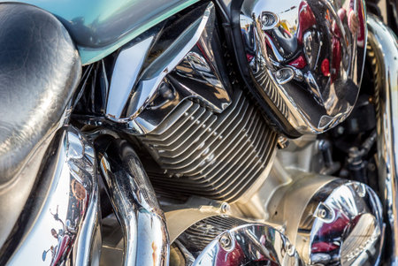 Chromed motorcycle parts on a sunny day.
