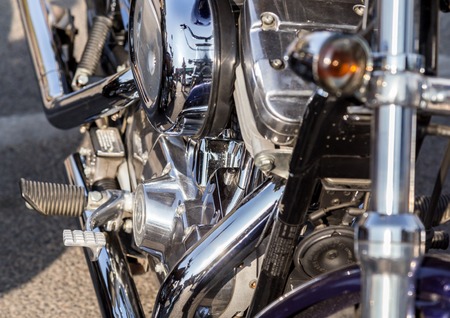 Chromed motorcycle parts on a sunny day.の写真素材