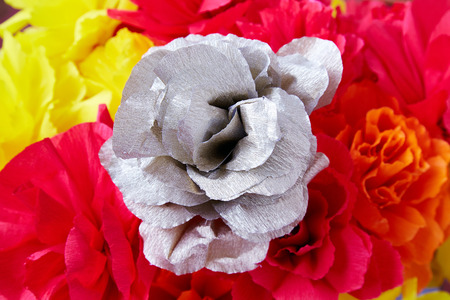 Red yellow flowers made of paper backgroundの写真素材