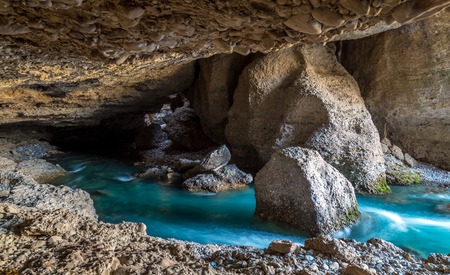 Panorama of the underground lake in a cave of bright blue color.の写真素材