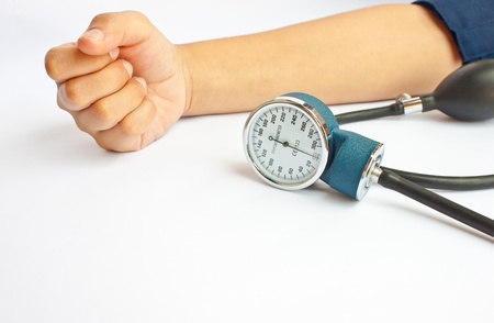 measuring patient blood pressure of people in Asiaの写真素材