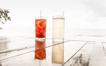 Two glasses of water on table