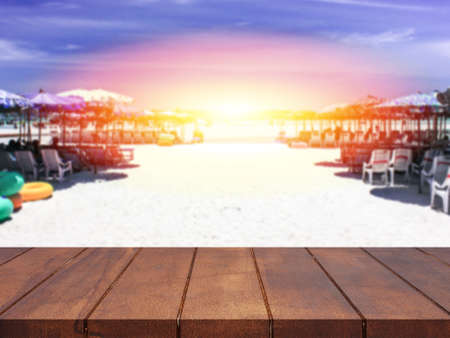 Empty top wooden table on blurred sea, For product display montageの写真素材