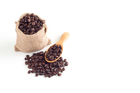 Coffee seeds in sack on white background, Top view, With copy spaceの写真素材