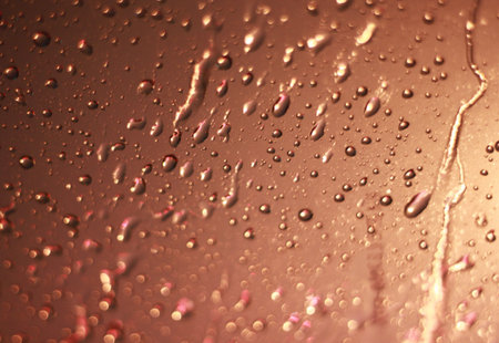 Blurred background drop water and car lightingの写真素材