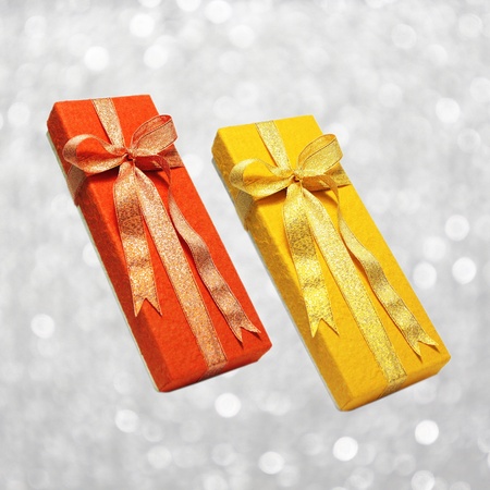 red gift box and gold gift boxの写真素材