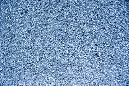 wall of gravel, the back background is blue. picture for the inscription. copyspaceの写真素材
