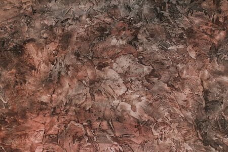 brown with orange color. Texture textured plaster of different shades. Background for designers.の写真素材