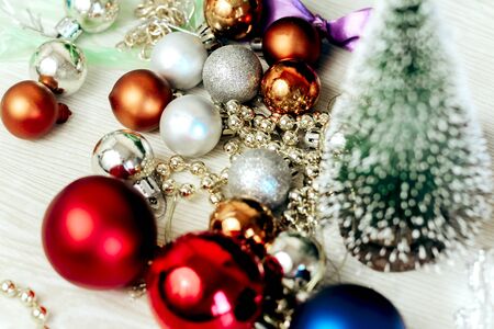 Christmas and new year tree toys. Preparing for the holidays. Multicolored shiny Christmas tree toysの写真素材