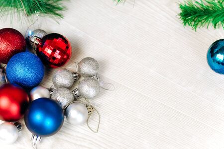 Christmas and new year tree toys. Preparing for the holidays background. Multicolored shiny Christmas tree toys. space for textの写真素材