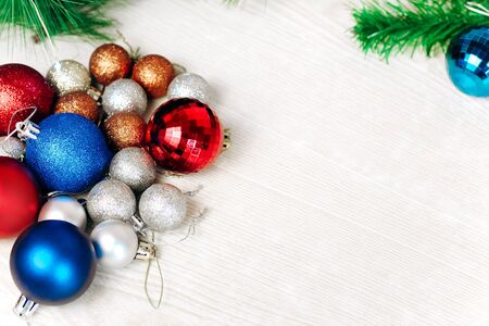 Christmas and new year tree toys. Preparing for the holidays background. Multicolored shiny Christmas tree toys. space for textの写真素材