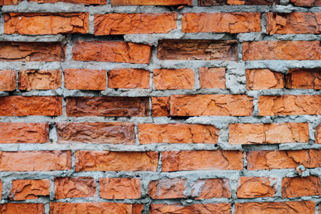wall of the house of the old red brick. texture and background for designersの写真素材