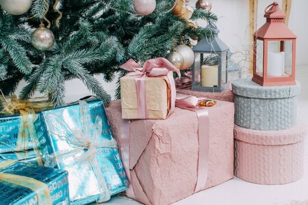 Christmas and new year tree toys. Preparing for the holidays. Multicolored shiny Christmas tree toys.giftsの写真素材