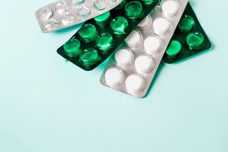 Different medicines tablets and  pills in blister pack. space for textの写真素材