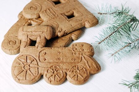 Christmas gingerbread cookies in the shape of a steam train.の写真素材