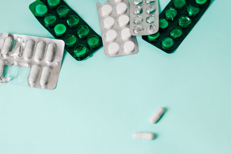 Different medicines tablets and  pills in blister pack. space for text