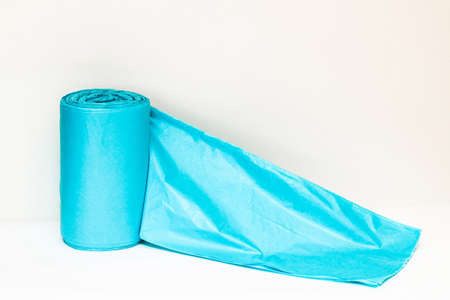 Blue packaging trash bags on a white background.の写真素材