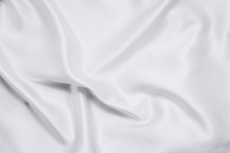 Nude silk texture. Satin delicate powdery glitter finish, beautiful backdrop for designersの写真素材