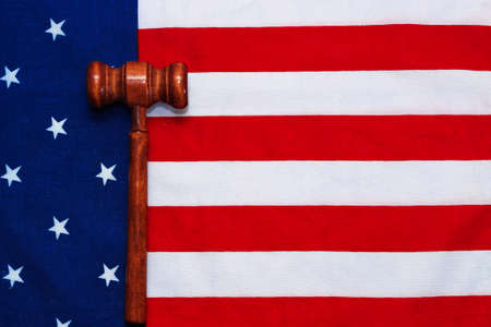 Judge gavel against USA flag background. Concept.の写真素材