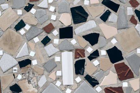 Texture background from mosaic old ceramic tiles. Colorful facade decoration.の写真素材