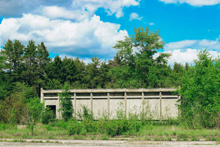 Abandoned empty city, multi-storey building. Empty rooms without windows.の写真素材