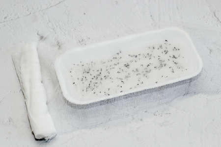 We grow lettuce, basil and onion seeds at home. For vitamins for a person, microgreen at home.の写真素材