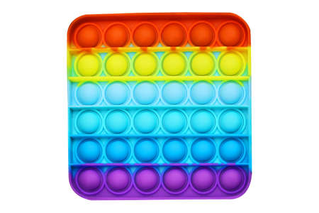 Ukraine, Cherkassy - June 18, 2021: Isolated on white background square multicolored bubble toy antistress sensory pop it.のeditorial素材