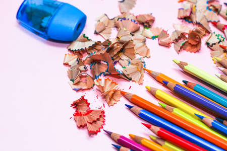 Multi-colored professional pencils with a sharpener.の写真素材