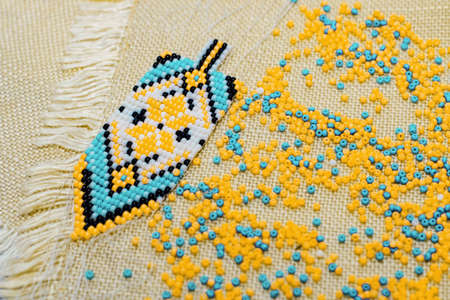Ethnic decoration gerdan, viconane z biseru, ukrainian gerdan and earrings. hand weaving, geometric pattern.の写真素材