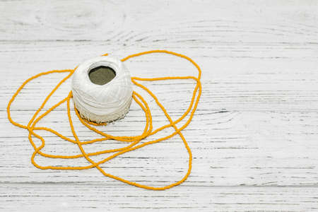 Ball of thread for creativity and needlework with beads.の写真素材