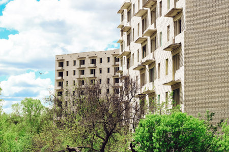 Abandoned empty city, multi-storey building. Empty rooms without windows.の写真素材