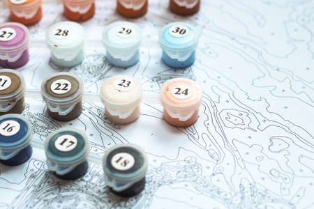 Multi-colored acrylic paints on the pattern drawing pictures by numbersの写真素材