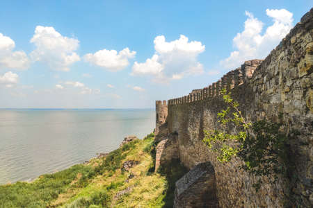 Medieval walls of a defensive castle overlooking the sea strait.のeditorial素材