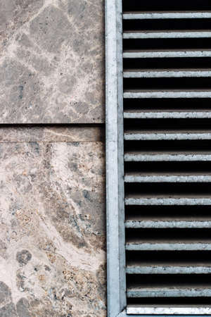 Wall texture with gray ventilation grillの写真素材