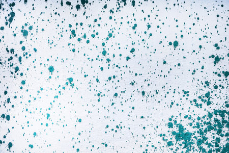 paint was spread on the wall in dots texture