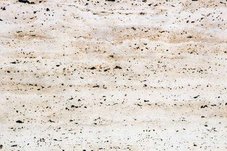 the texture of natural stone in a beige shade is similar to marble.の写真素材