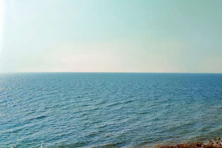 seascape water surface, horizon and sky.の写真素材